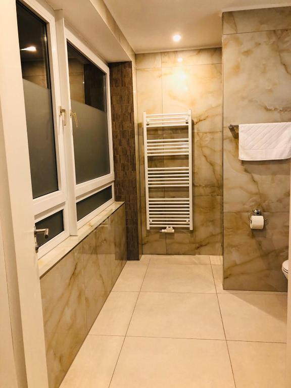 Koupelna v ubytování Elbgalerie Hotel