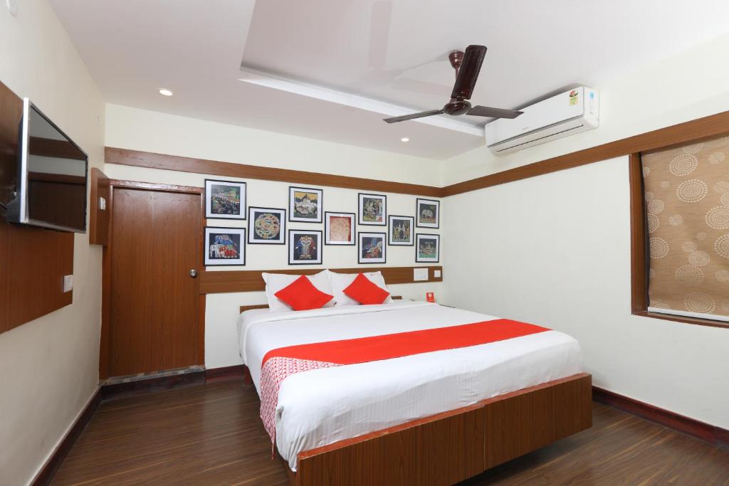 Postel nebo postele na pokoji v ubytování Hotel Ramakrishna