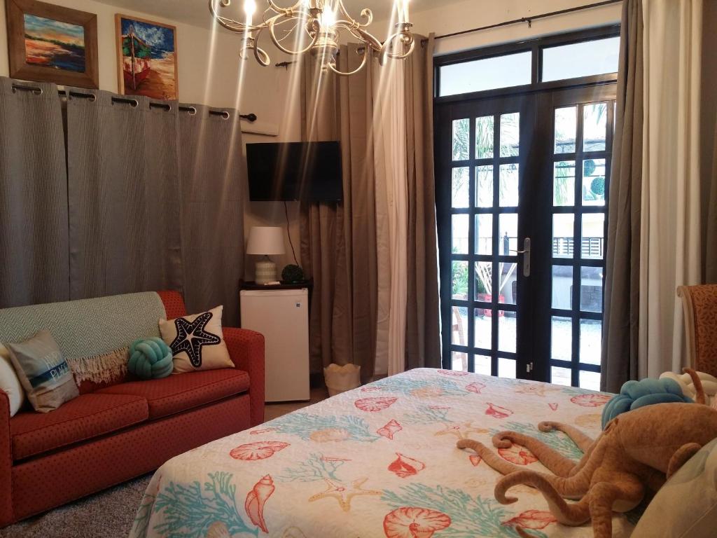Postel nebo postele na pokoji v ubytování Casa Bonita Inn