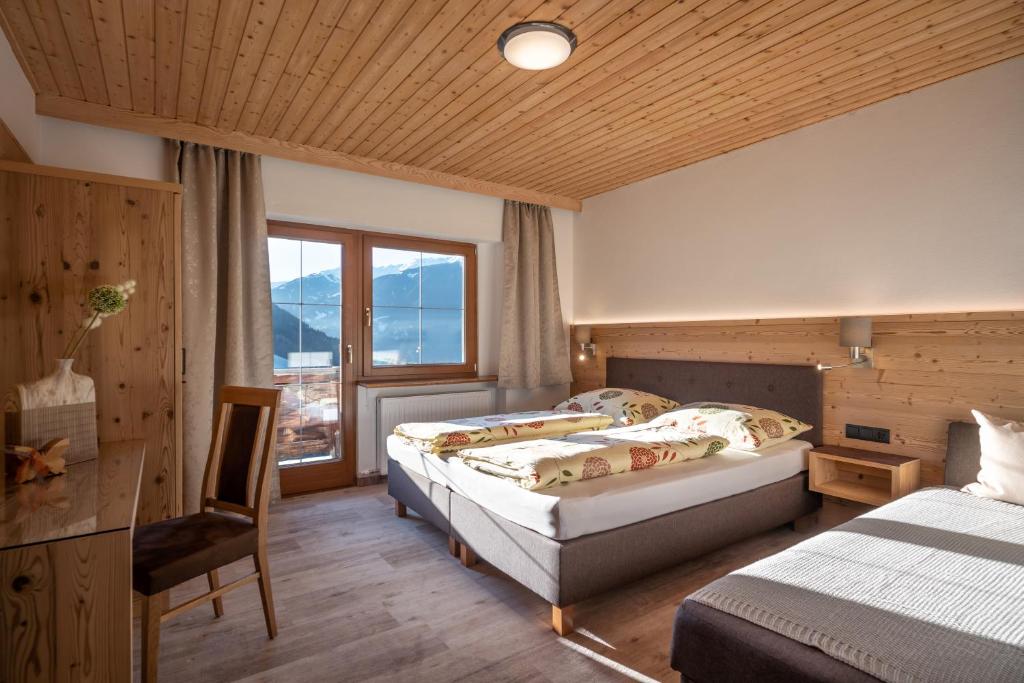 Postel nebo postele na pokoji v ubytování Haus Panorama