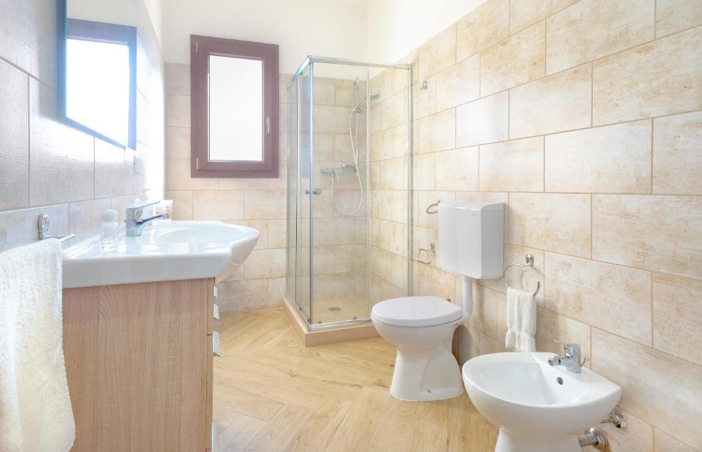 A bathroom at Dependance Specchia with Pool