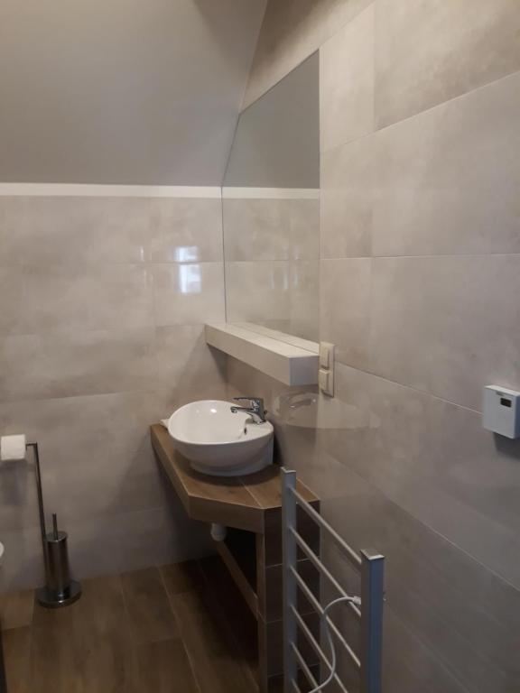 Kúpeľňa v ubytovaní Apartamenty Pod Skrzycznem