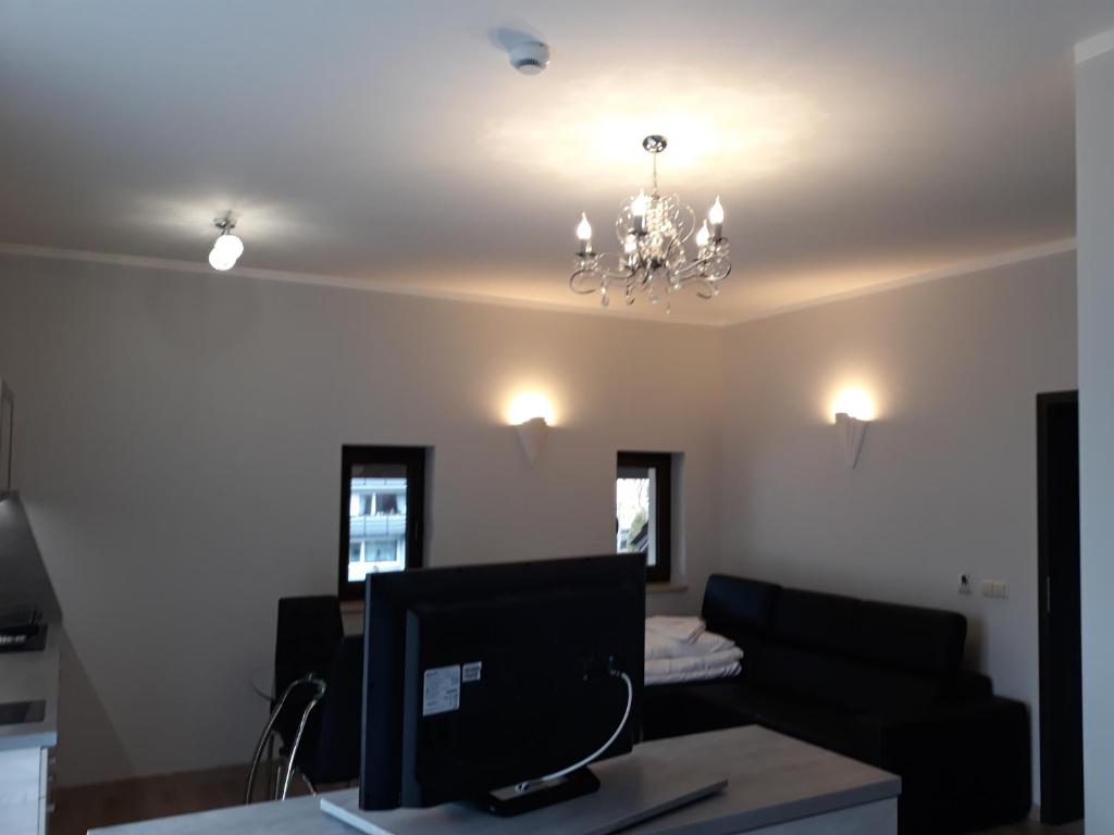 Posteľ alebo postele v izbe v ubytovaní Apartamenty Pod Skrzycznem