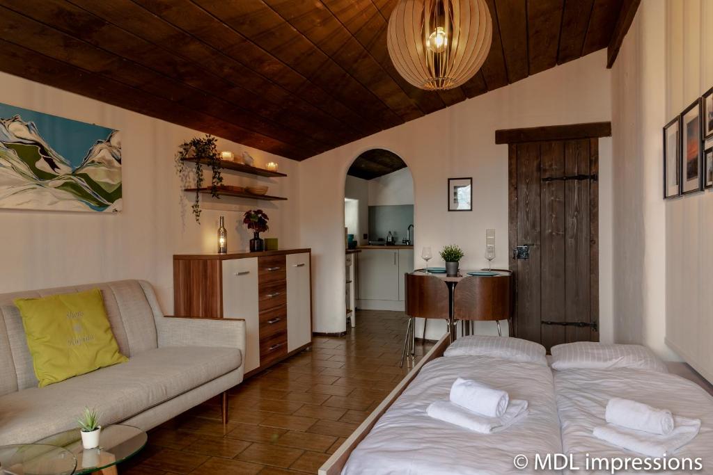 Postel nebo postele na pokoji v ubytování Apartment SHEPS in Kaprun