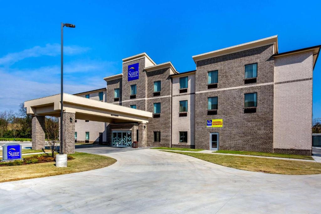 a rendering of a hotel with a gas station at Sleep Inn & Suites Gallatin - Nashville Metro in Gallatin