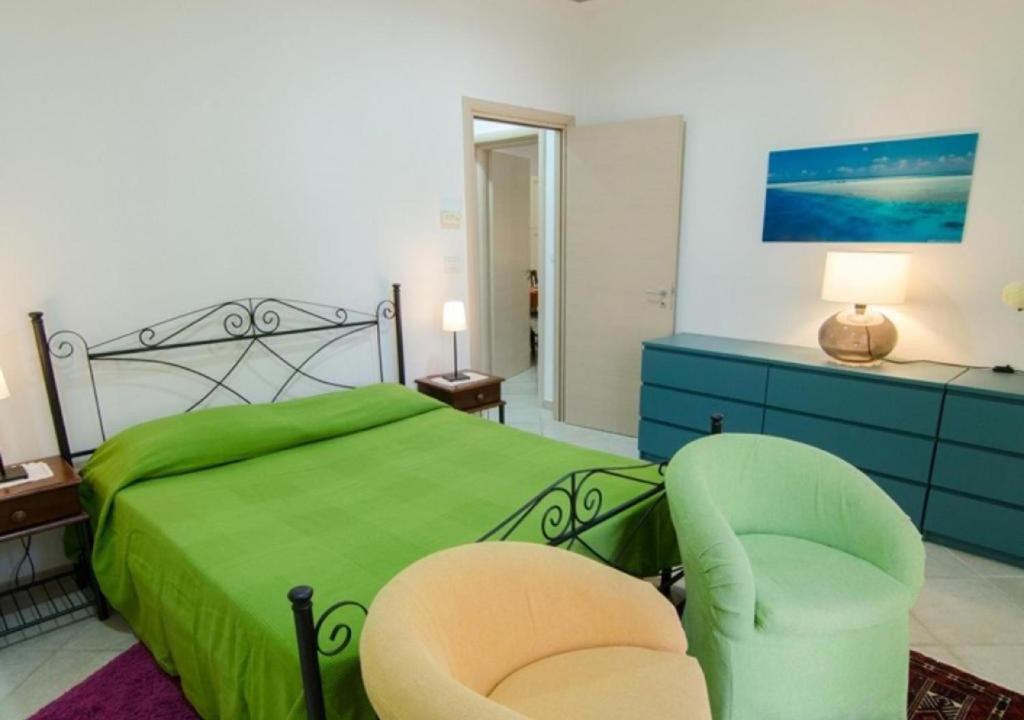 Postel nebo postele na pokoji v ubytování Fuori Rotta Holiday Home
