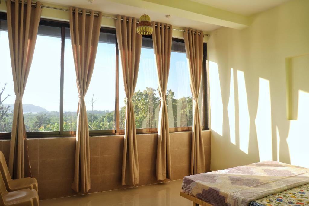 Hotel New Konkan - Housity