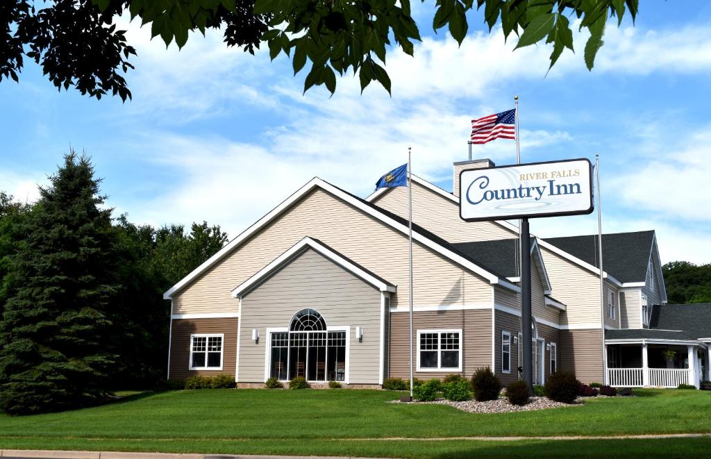 a church with a sign in front of it at Country Inn River Falls in River Falls