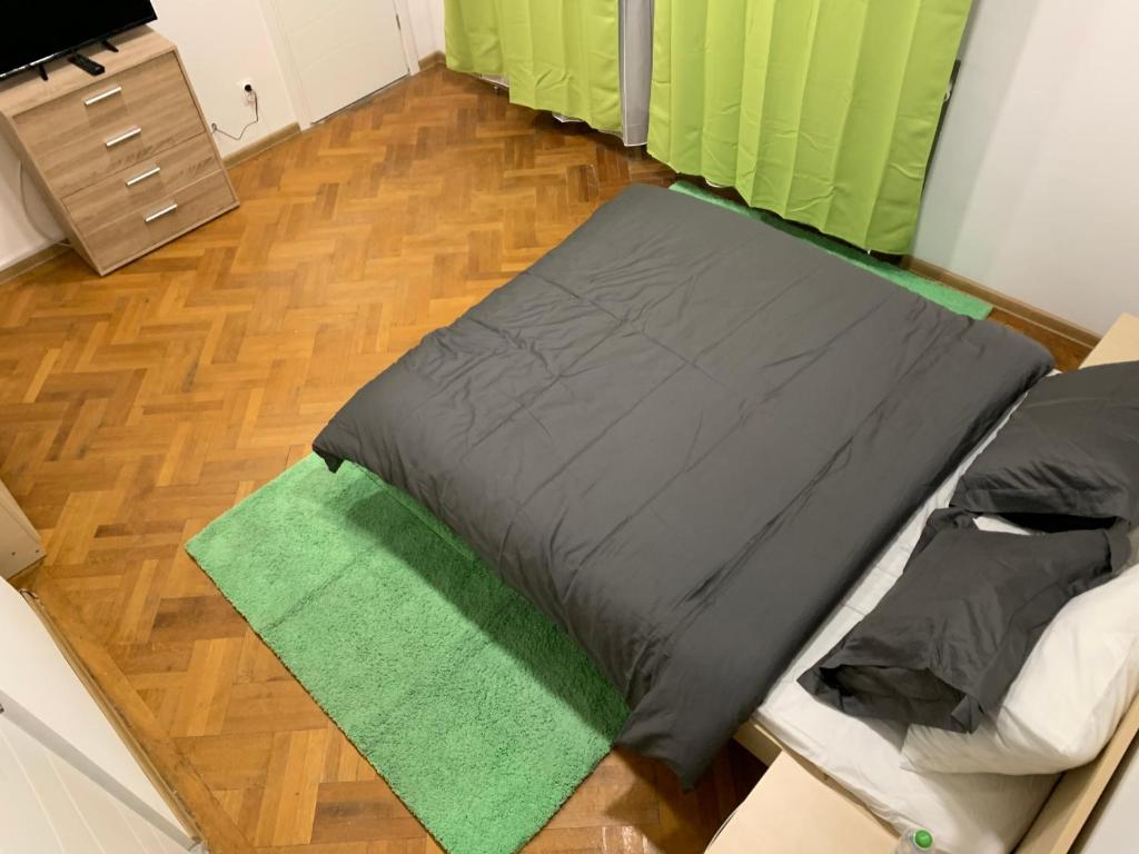 Postel nebo postele na pokoji v ubytování Bucarest B&B