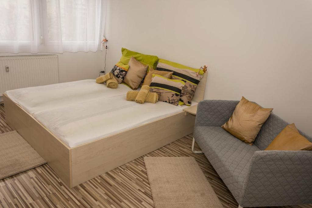 Posteľ alebo postele v izbe v ubytovaní Central Home- Pesterzsébet