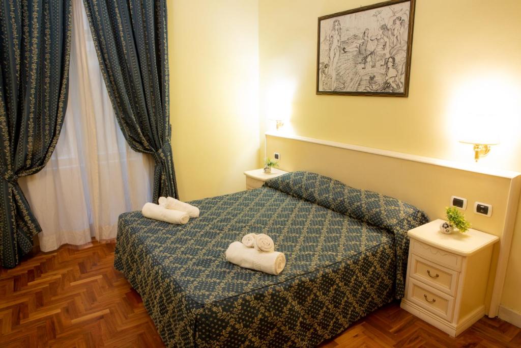 Łóżko lub łóżka w pokoju w obiekcie Annette B&B
