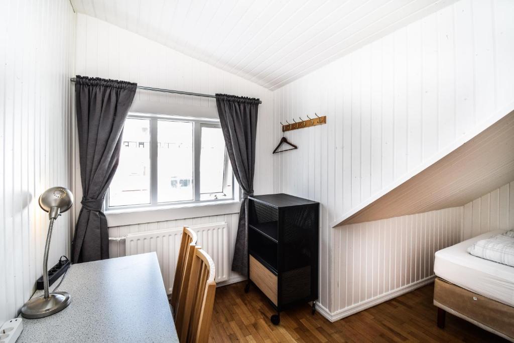 Postel nebo postele na pokoji v ubytování Guesthouse Aurora