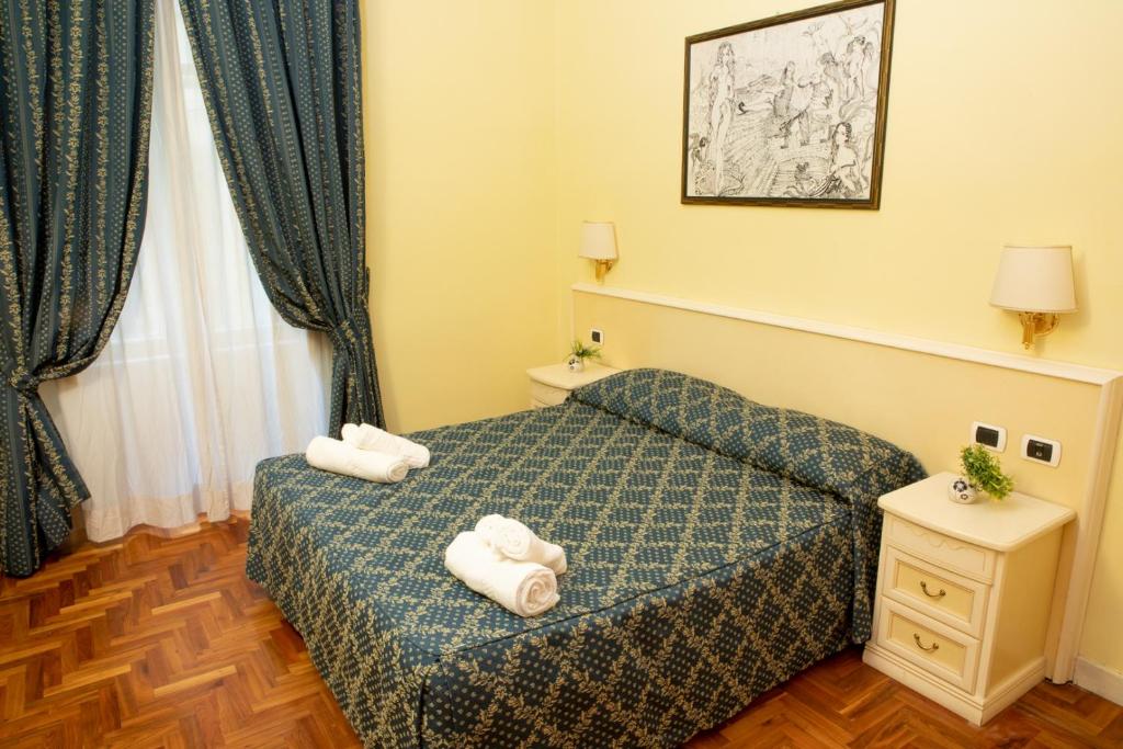 Łóżko lub łóżka w pokoju w obiekcie Annette B&B