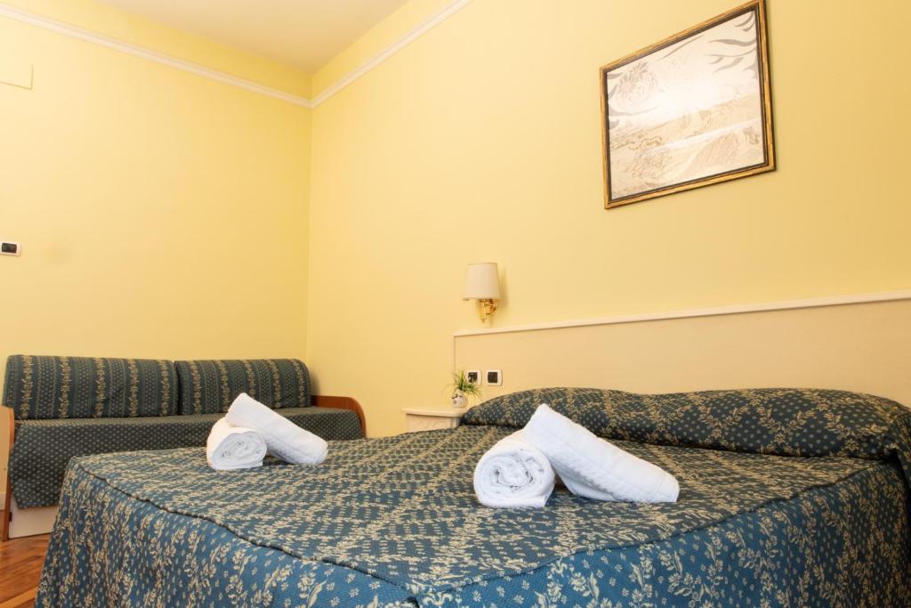 Łóżko lub łóżka w pokoju w obiekcie Annette B&B
