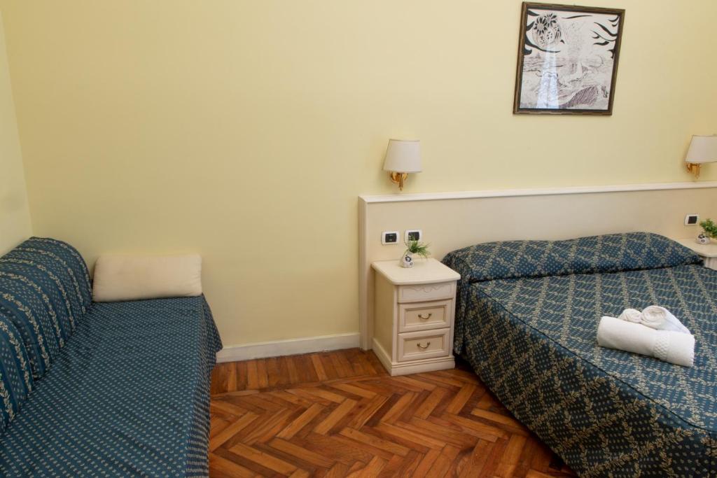 Łóżko lub łóżka w pokoju w obiekcie Annette B&B