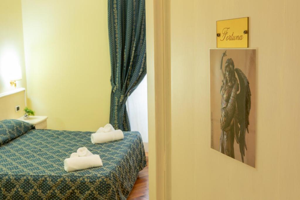 Łóżko lub łóżka w pokoju w obiekcie Annette B&B