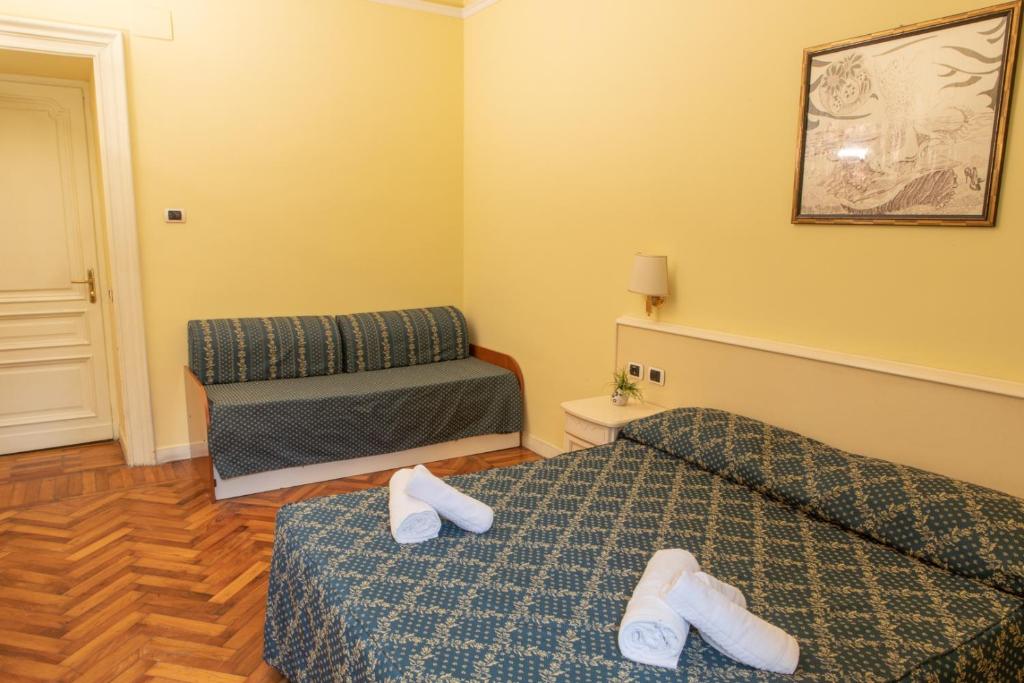 Łóżko lub łóżka w pokoju w obiekcie Annette B&B