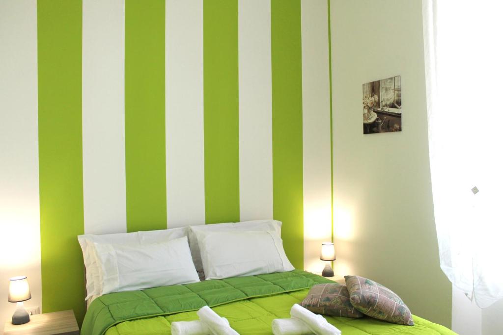 Postel nebo postele na pokoji v ubytování Le Mirage boutique II
