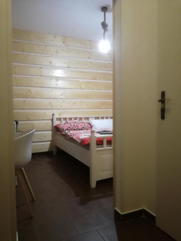 Postel nebo postele na pokoji v ubytování Svatý Jakub