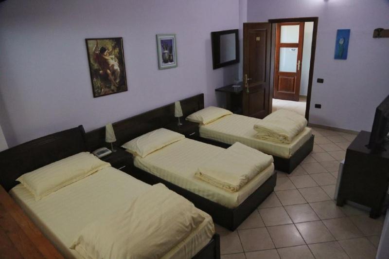 Postel nebo postele na pokoji v ubytování Resort Nord Park