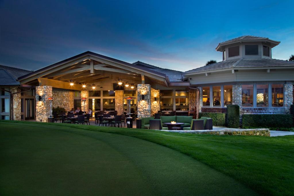 an exterior view of a house at night at Arnold Palmer's Bay Hill Club & Lodge in Orlando