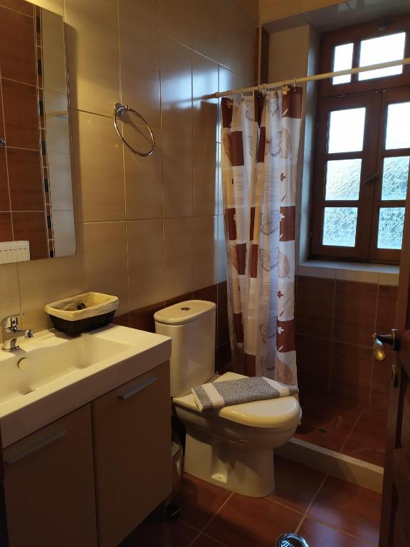 Kúpeľňa v ubytovaní Aggelon Katafygio