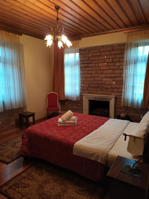 Posteľ alebo postele v izbe v ubytovaní Aggelon Katafygio