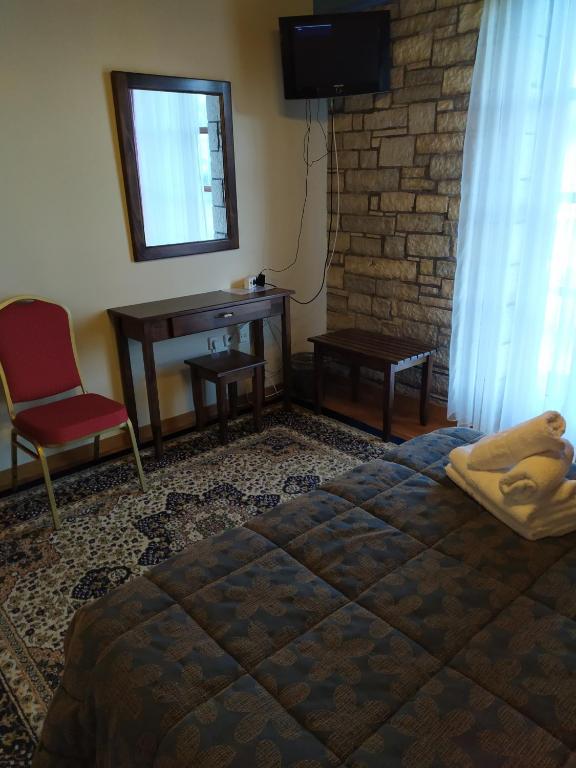 Posteľ alebo postele v izbe v ubytovaní Aggelon Katafygio