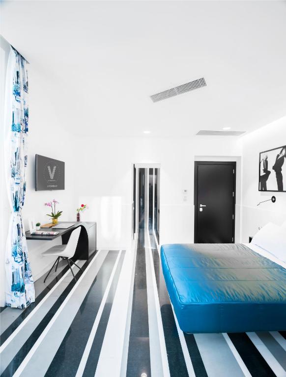 En TV eller et underholdningssystem på V-Accommodation IV Fontane