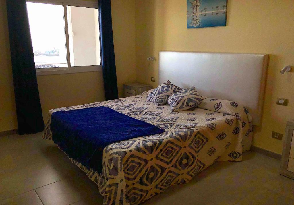 Posteľ alebo postele v izbe v ubytovaní Apartamentos La Puntilla Mogan