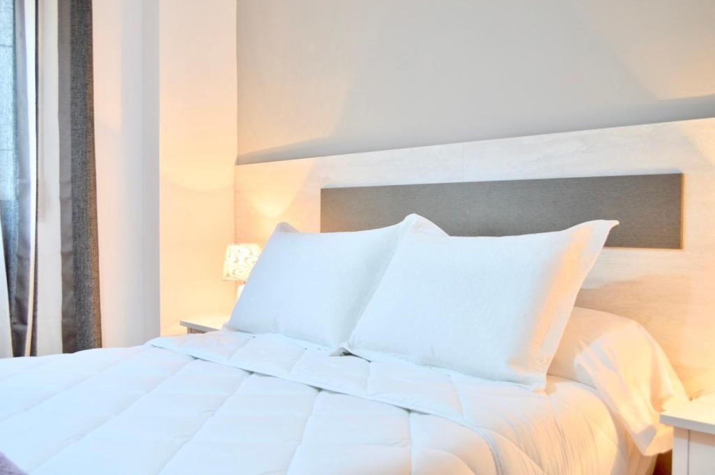 A bed or beds in a room at Evaleta