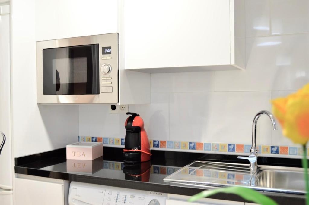 A kitchen or kitchenette at Evaleta