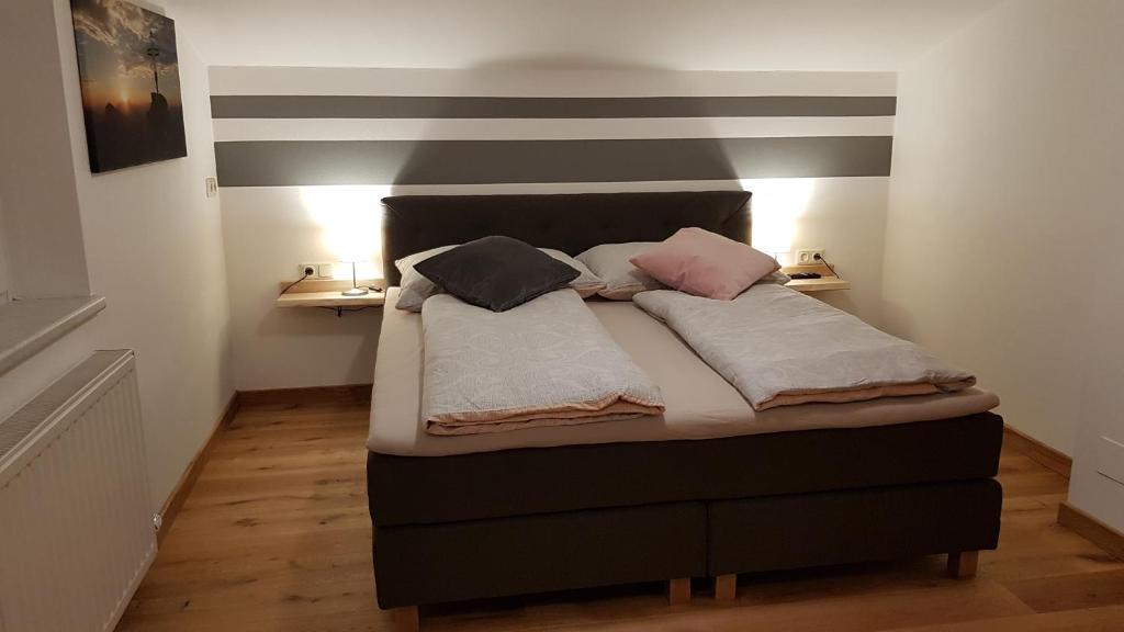 Postel nebo postele na pokoji v ubytování Apartments Köhlbichler