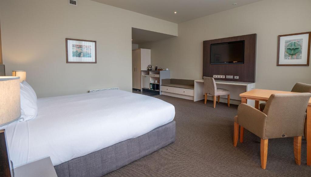 Postel nebo postele na pokoji v ubytování Scenic Hotel Dunedin City