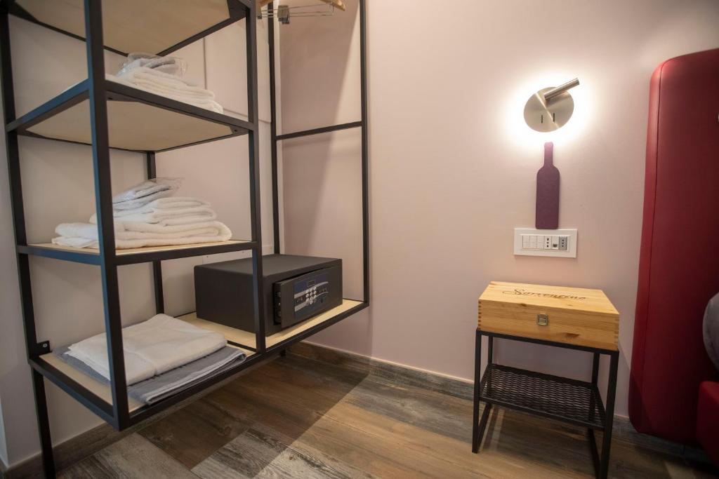 Postel nebo postele na pokoji v ubytování Vesuvio Inn Bed & Wine Experience