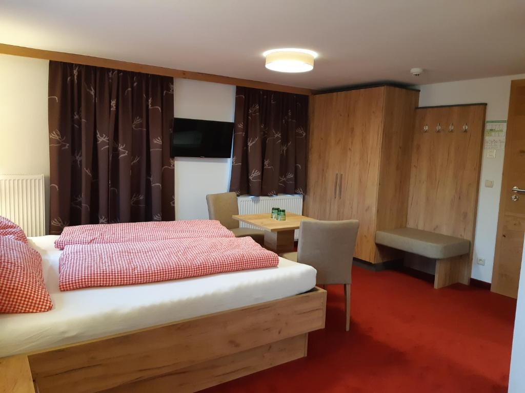 Postel nebo postele na pokoji v ubytování Pension Thainerhof