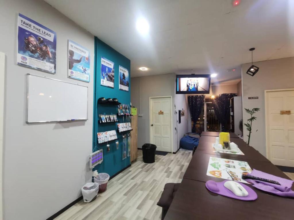TV a/nebo společenská místnost v ubytování Zero Gravity Homestay 零重力民宿