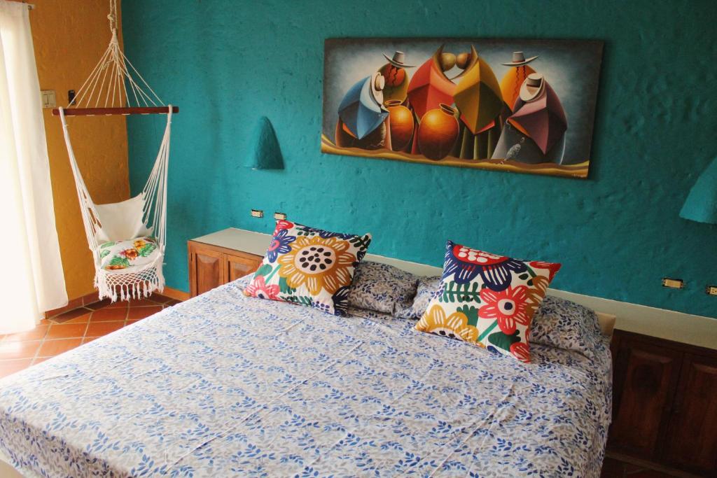 Postel nebo postele na pokoji v ubytování Casa Amarilla