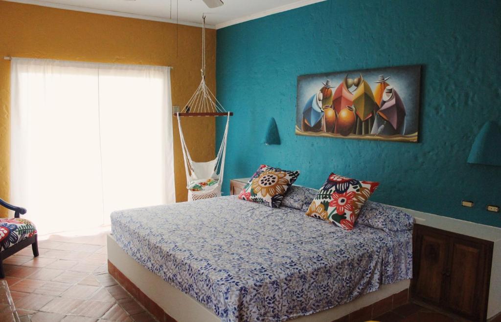 Postel nebo postele na pokoji v ubytování Casa Amarilla