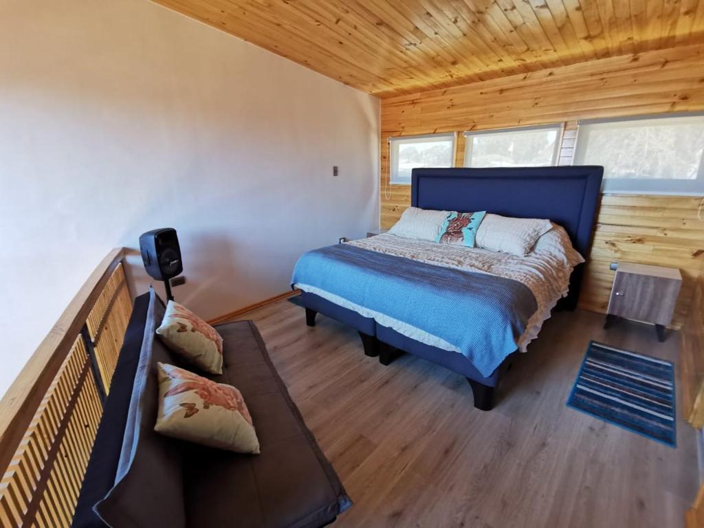 Krevet ili kreveti u jedinici u okviru objekta Hermosa casa en Pichilemu, en condominio con salida al mar