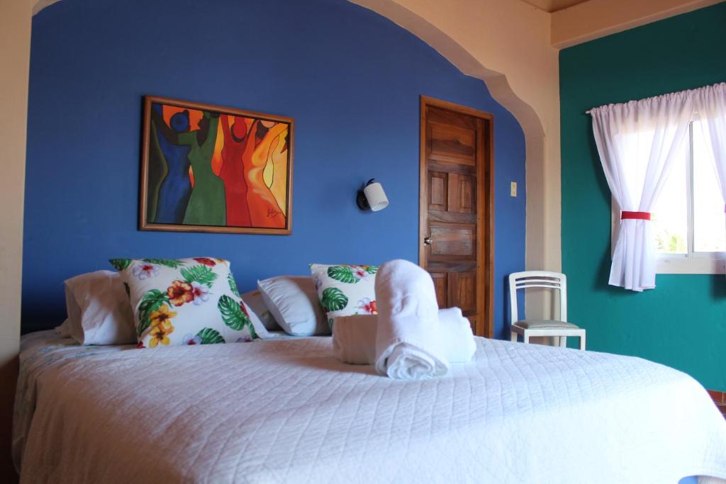 Postel nebo postele na pokoji v ubytování Casa Amarilla