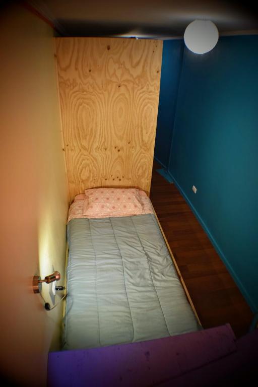 Postel nebo postele na pokoji v ubytování Kapai Hostel
