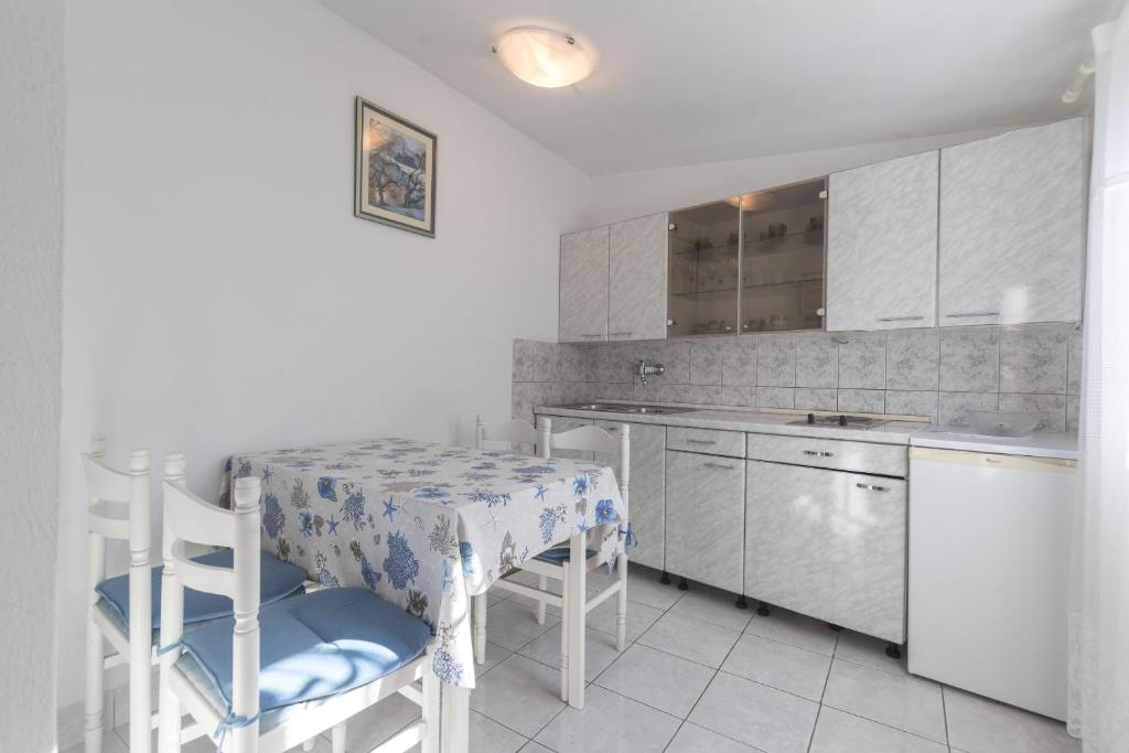 Kuchyň nebo kuchyňský kout v ubytování Apartments Jaksa
