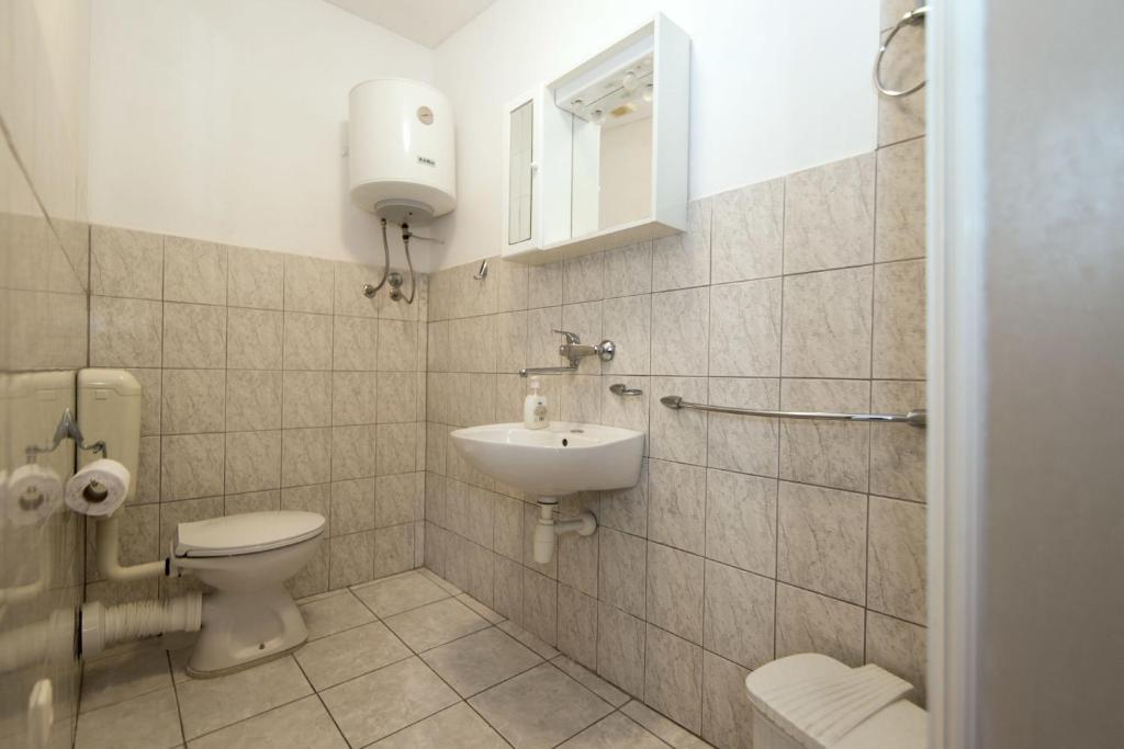 Koupelna v ubytování Apartments Jaksa