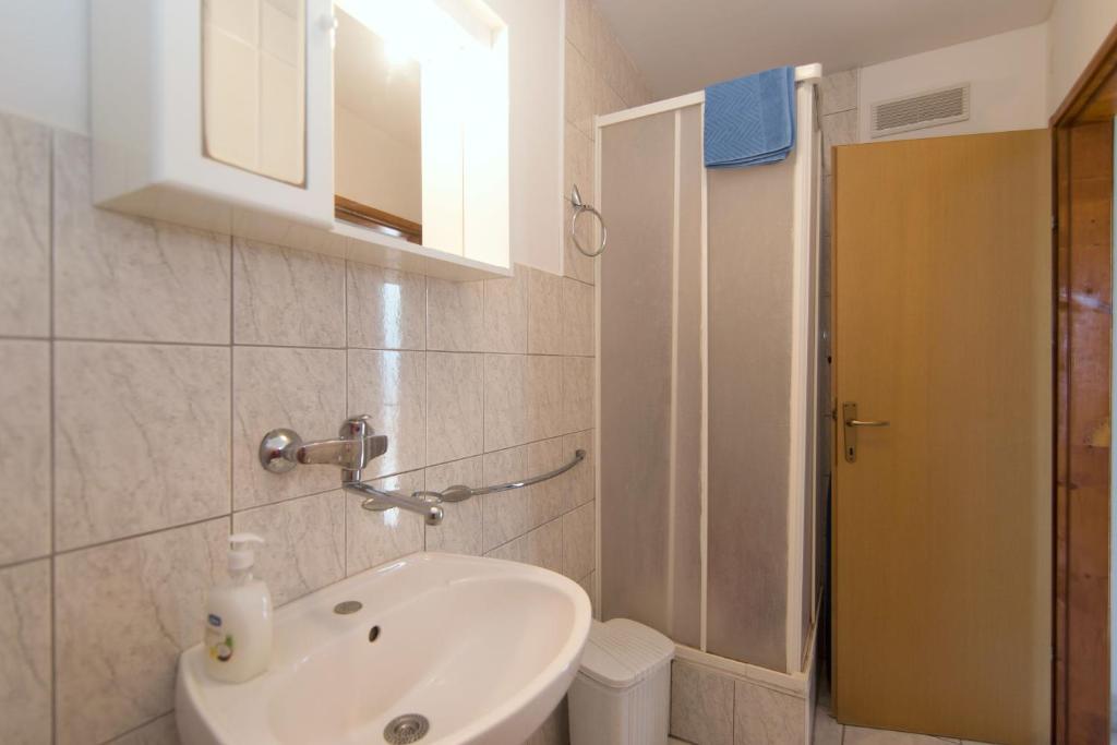 Koupelna v ubytování Apartments Jaksa