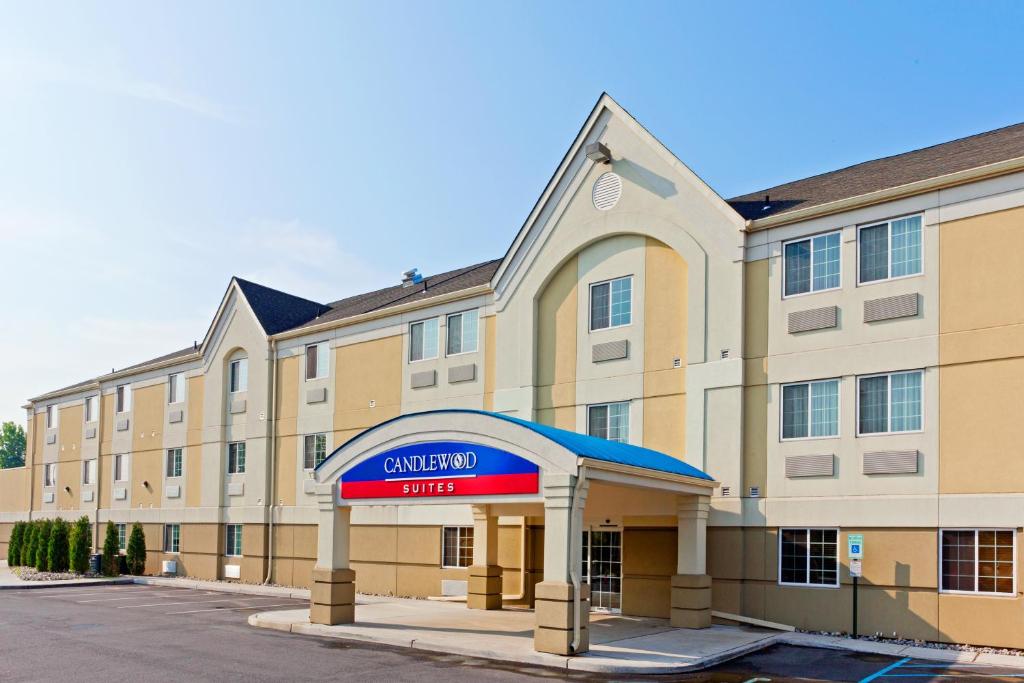 a hotel with a sign in front of a building at Candlewood Suites Secaucus, an IHG Hotel in Secaucus