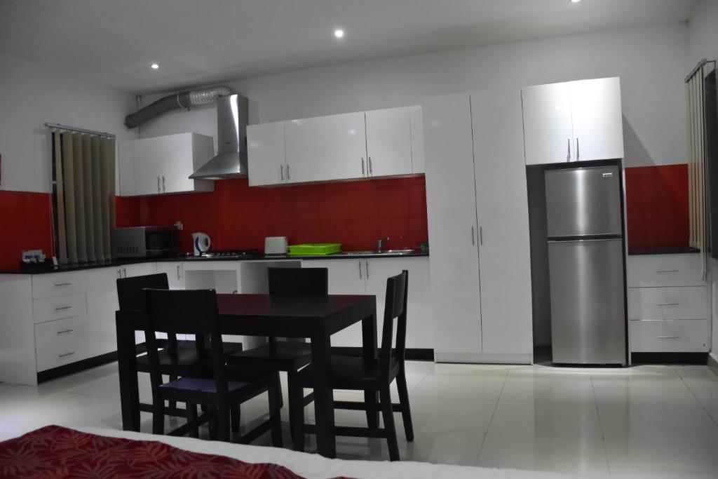 Kuchyň nebo kuchyňský kout v ubytování Best View Apartments