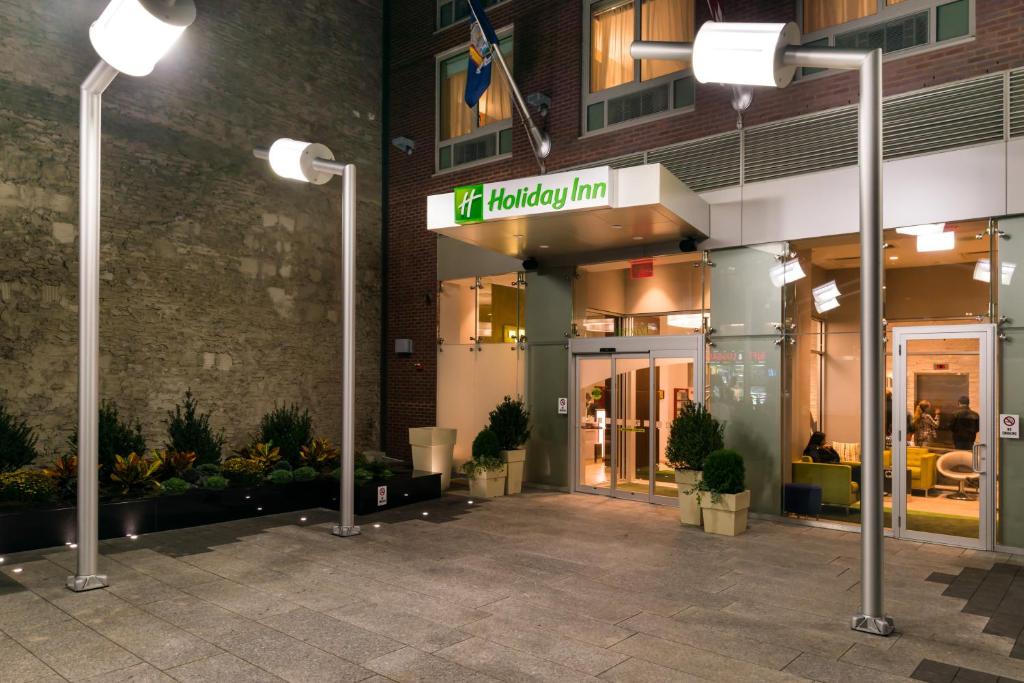 a building with a sign that reads va nursing inn at Holiday Inn New York City - Times Square, an IHG Hotel in New York