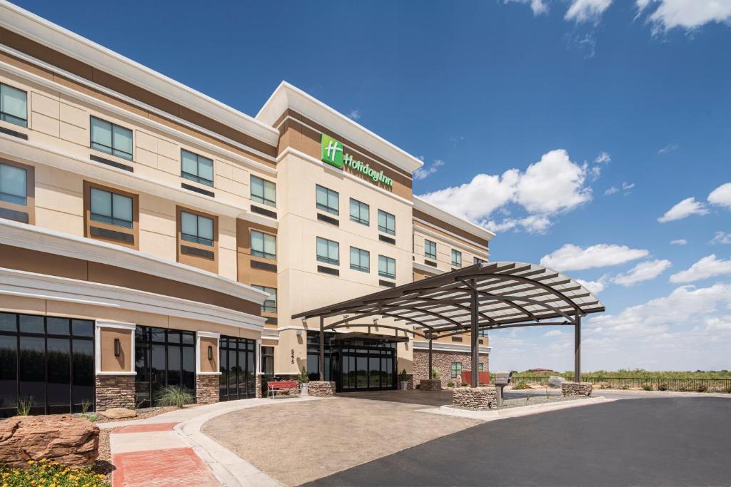 a rendering of the front of a hotel at Holiday Inn Odessa, an IHG Hotel in Odessa