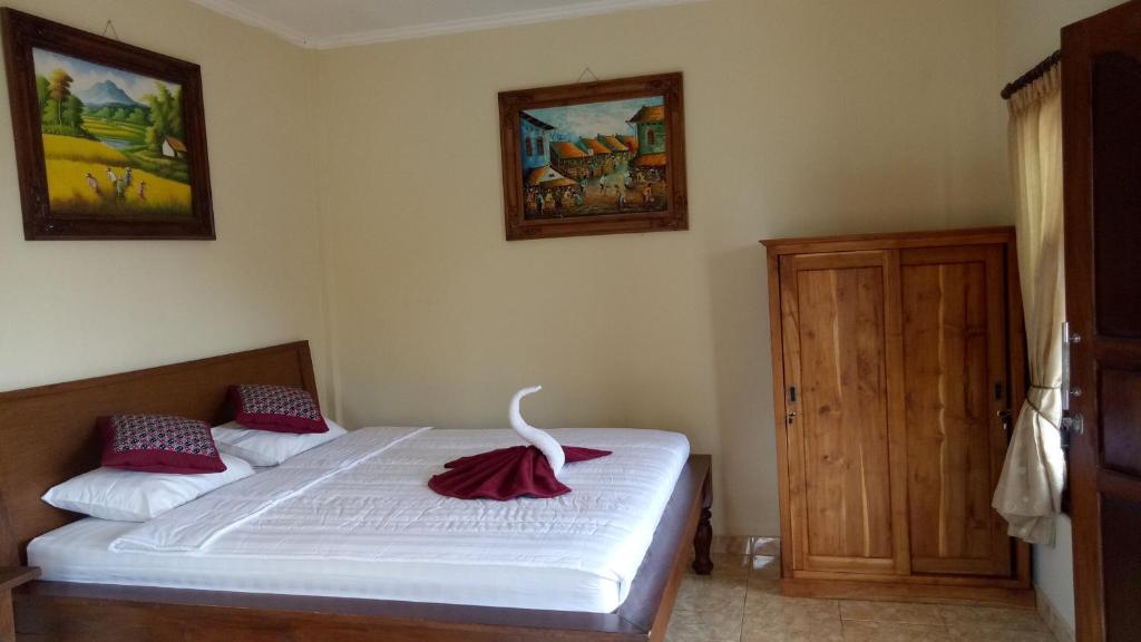 Postel nebo postele na pokoji v ubytování Happy Inn 2
